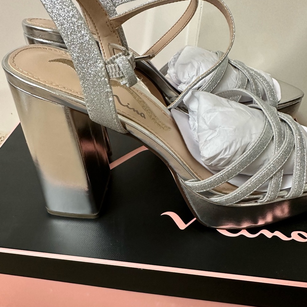 Brand new silver heels